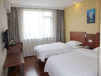 Super 8 By Wyndham Shanghai Jinshan Xuefulu Chengshi Sha Tan Rom bilde